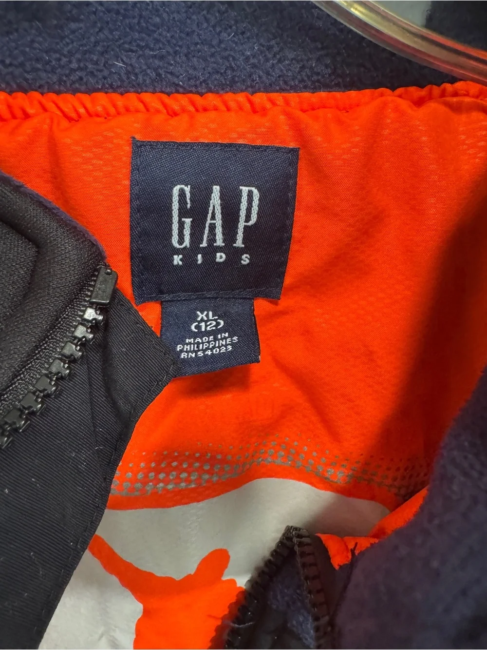 GAP Navy Fleece Jacket with Orange Accents; Colorblock Utility Snowboard icon